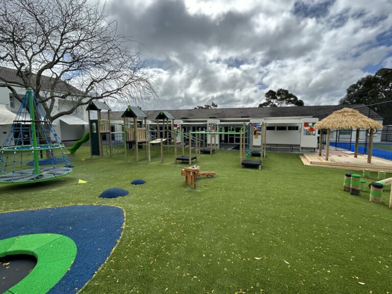 The playground design incorporated different areas and activities to engage all ages, including an Orex Spinner and a Fale stage for performance play.
