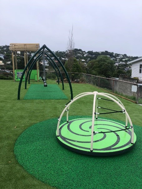 The new play area includes a Sensory Hut, Curved Leg Swing 2 Bay and Minidome Spinner.